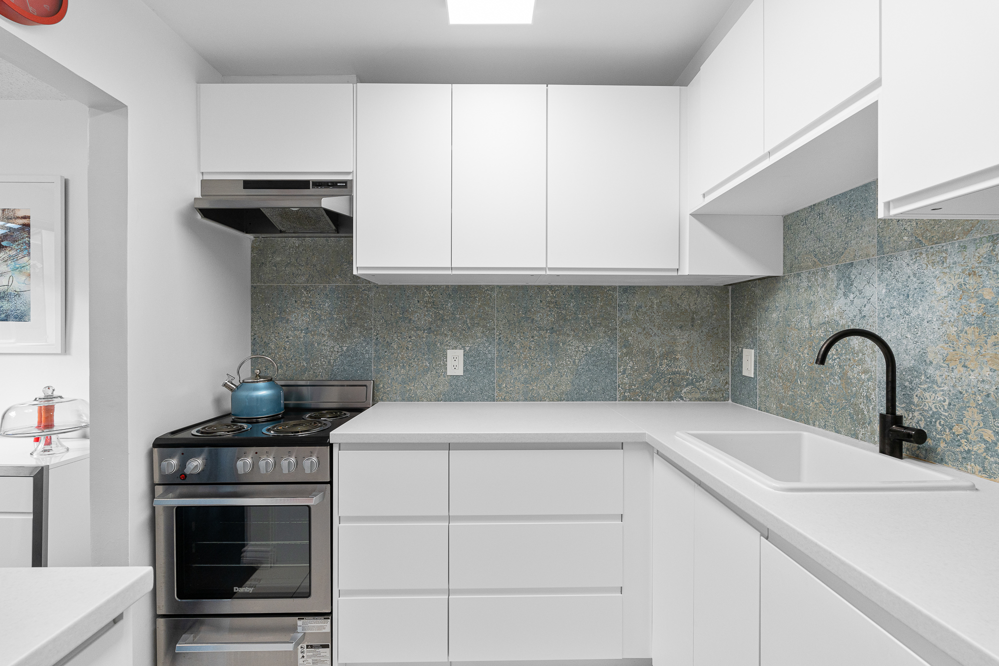 #105 – 1875 W 8th Avenue